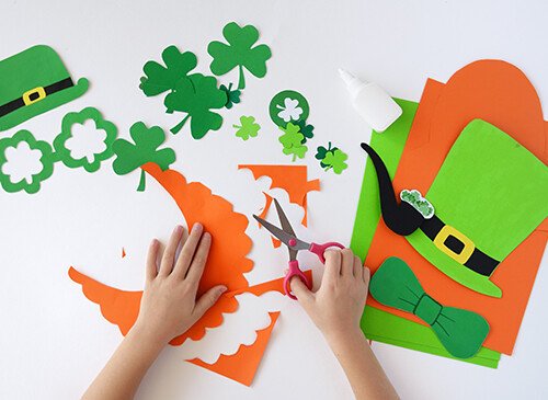 child making St. Patrick's Day crafts